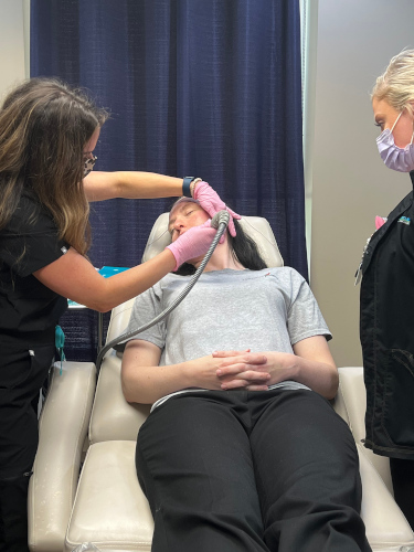 Patient receiving a Radiofrequency Microneedling treatment Patient receiving a Radiofrequency Microneedling treatment