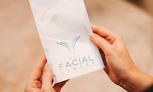 Pur providers holding membership boxes at The Facial Center.