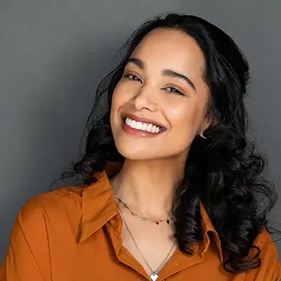 Woman with closed eyes going through laser treatment