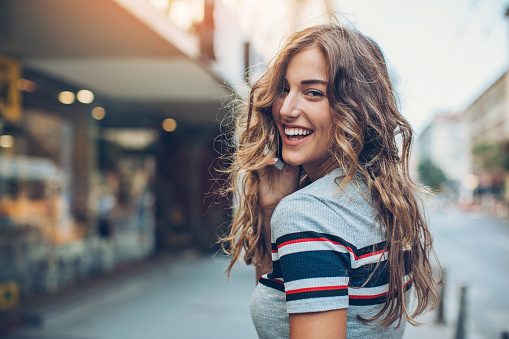 Smiling woman with beautiful skin thanks to microneedling by The Facial Center in Charleston, WV
