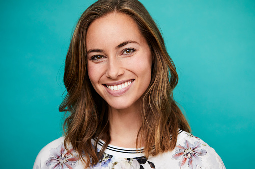 Beautiful young woman smiling after receiving Blepharoplasty surgery from The Facial Center in Charleston, WV Beautiful young woman smiling after receiving Blepharoplasty surgery from The Facial Center in Charleston, WV