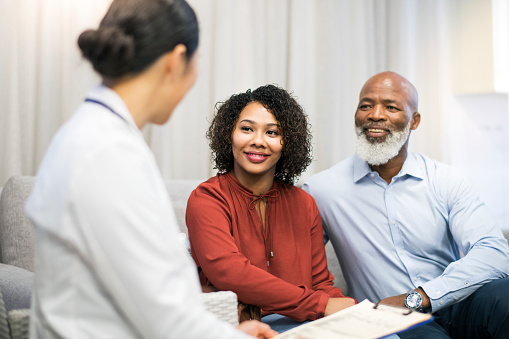 Patients having a consultation with their doctor Patients having a consultation with their doctor